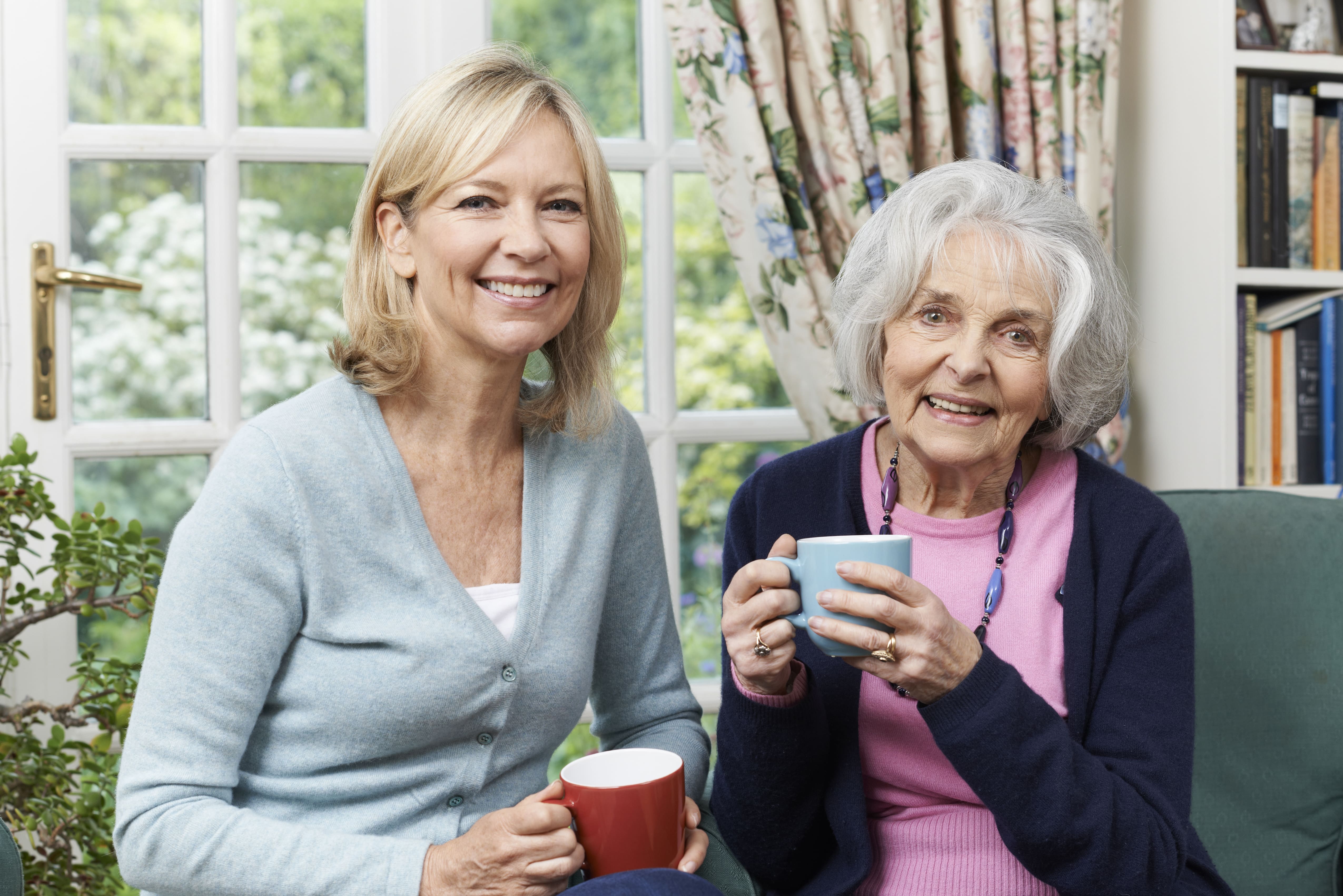 image of two women drinking a cup of tea