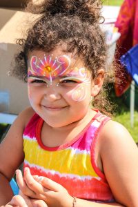 Smiling little girl with facepaint design