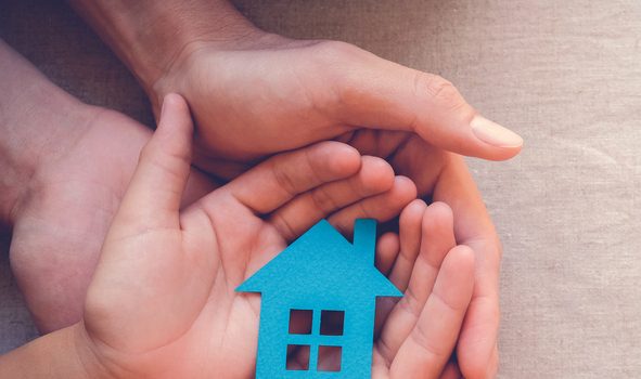 PHARE - Adult And Child Hands Holding Paper House